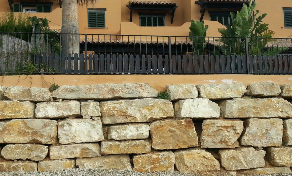 stacked boulder retaining wall