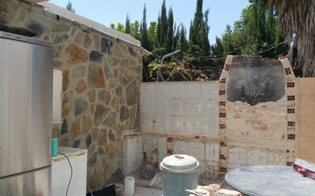 Outdoor BBQ and kitchen demolished
